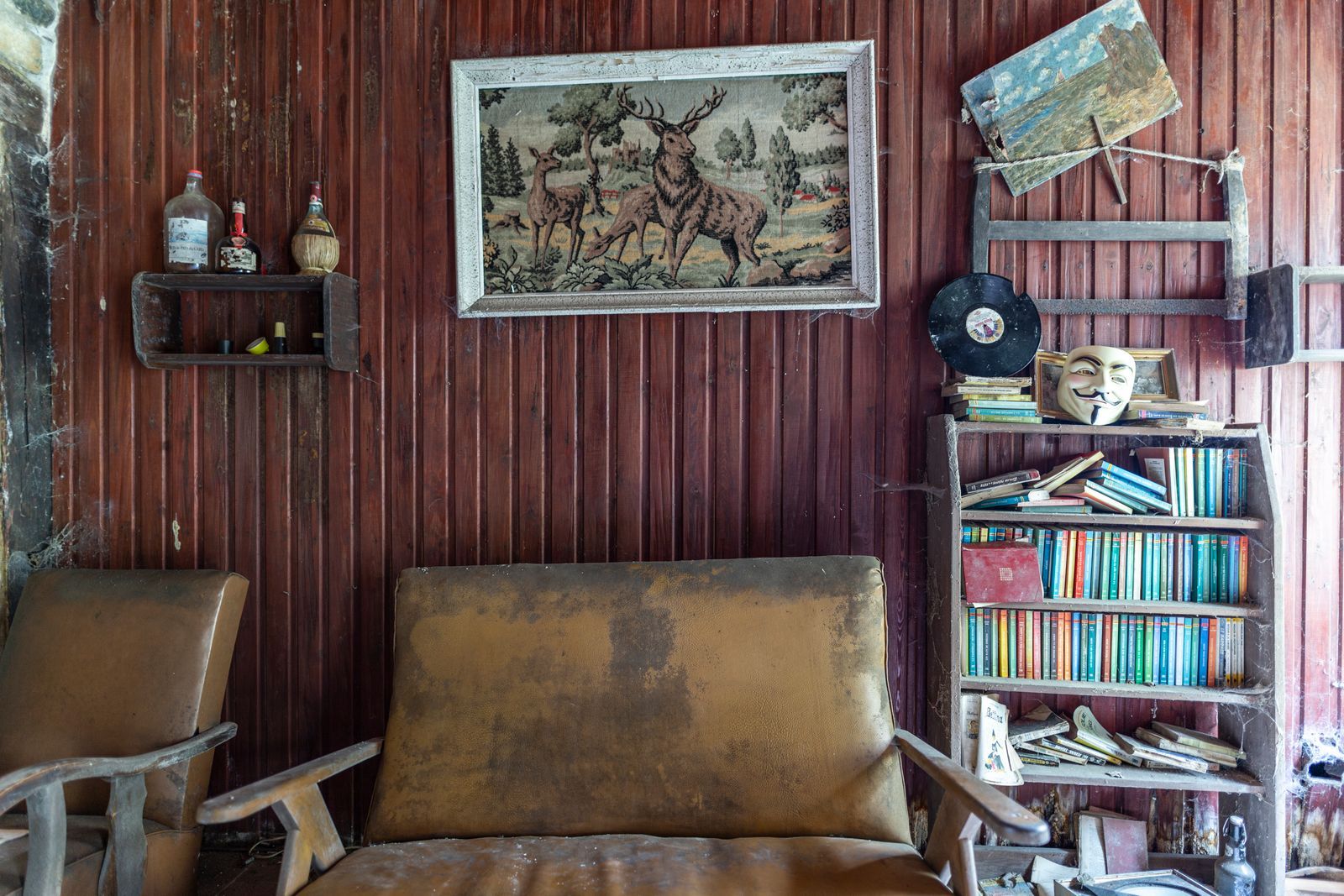 A room full of old furniture and belongings before a clear-out