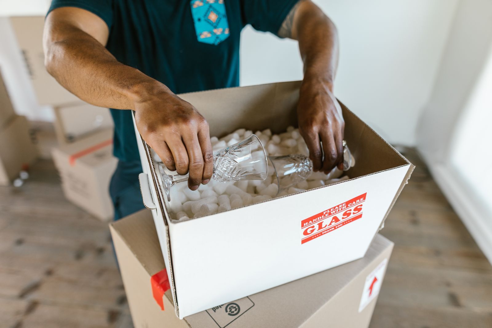 Packing glassware into a box