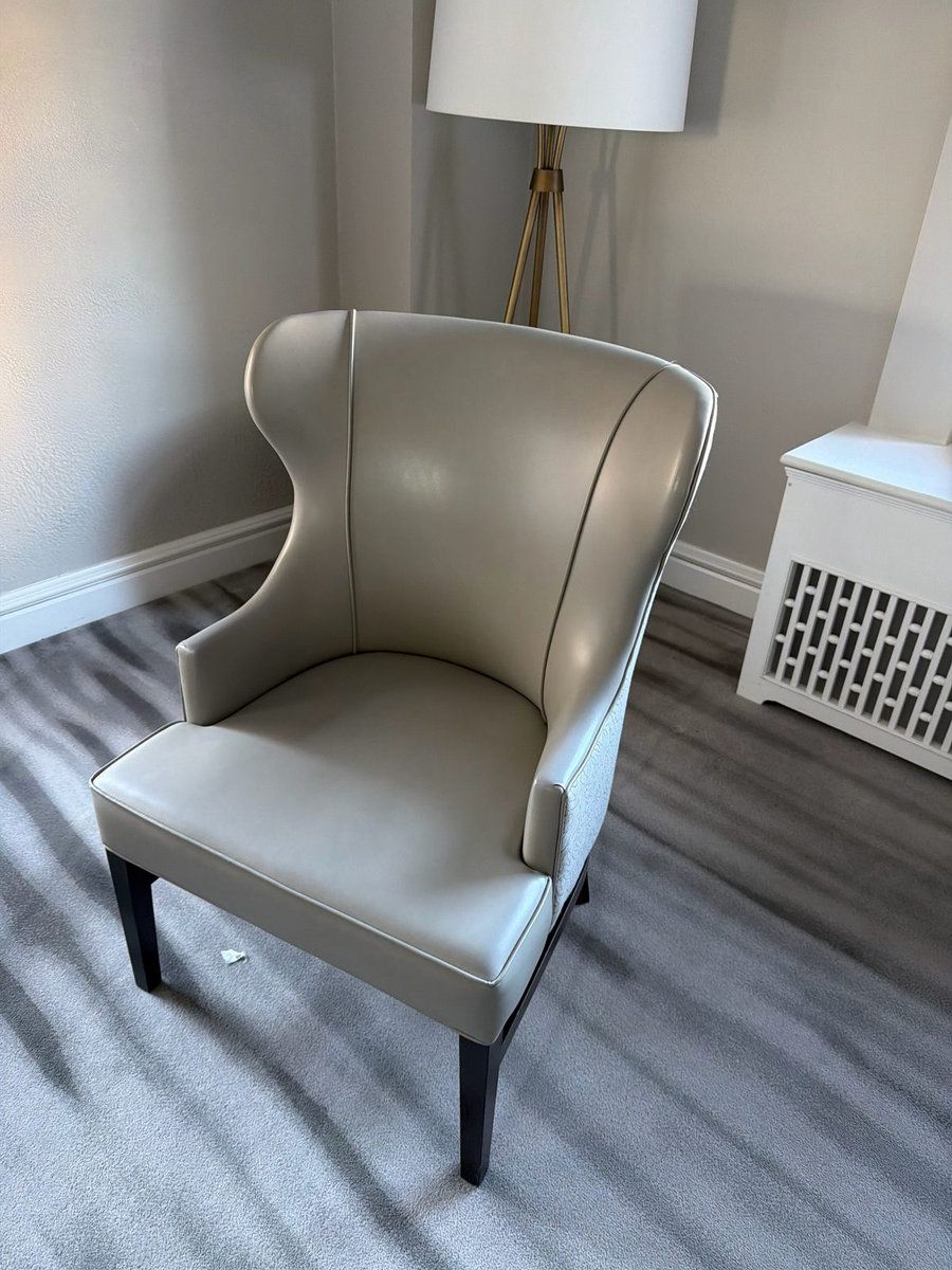 Wingback chair in a hotel room, from a hotel liquidation